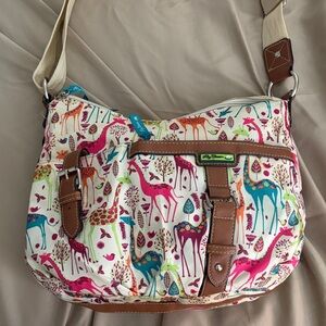 Lilly Bloom shoulder bag  meas 14x10x4in. 2
Large zipper compartments